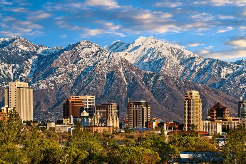 Skyline of downtown Salt Lake City with the Towering Wasatch Mountain range in the background